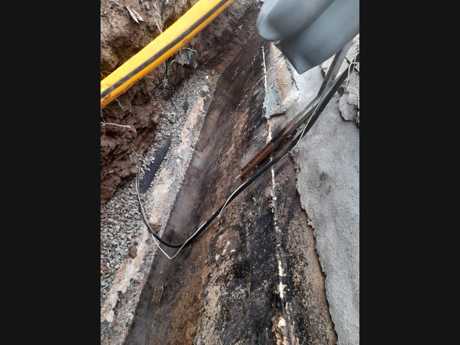 Standing water in a drainage pipe — a late-stage Orillia waterproofing problem