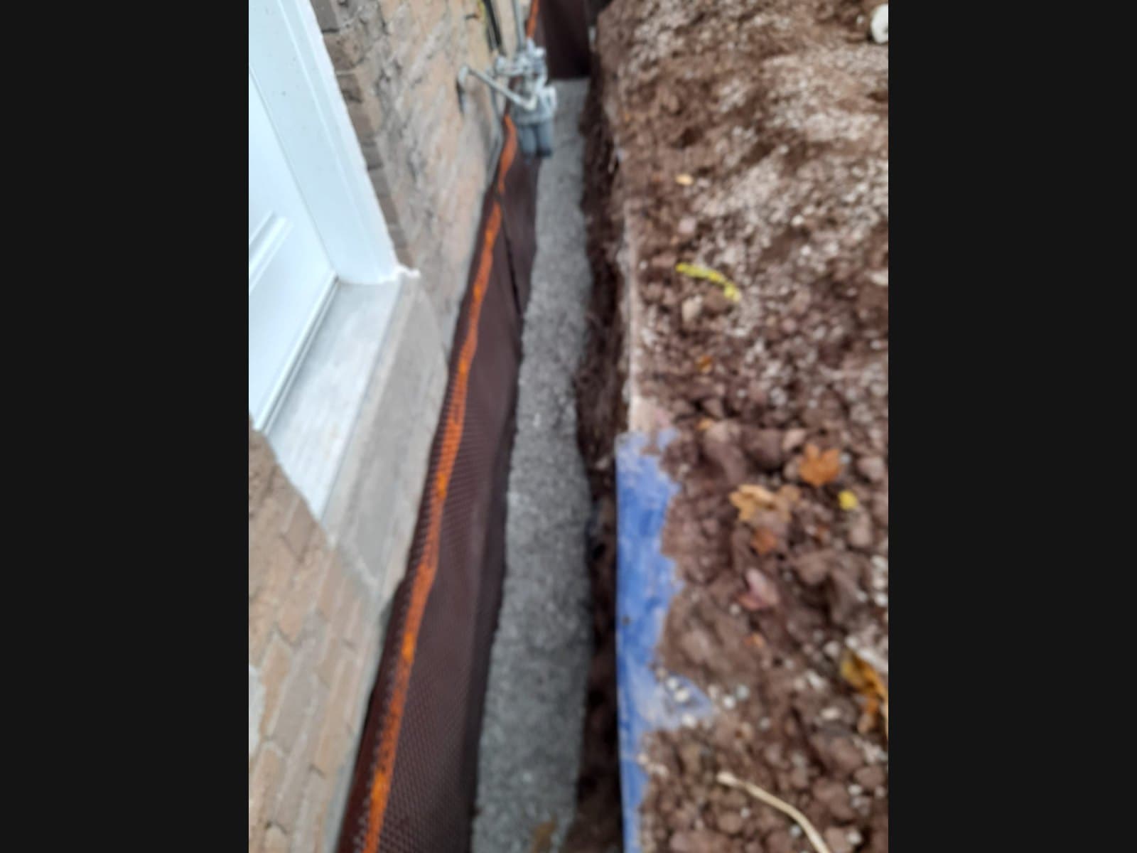 Weeping tile and drainage work on a rural Severn-area foundation